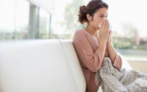 woman suffering from allergies | a_woman_suffering_from_allergies_or_asthma_due_to_poor_indoor_ait_quality | a_woman_suffering_from_allergies_or_asthma_due_to_poor_indoor_ait_quality
